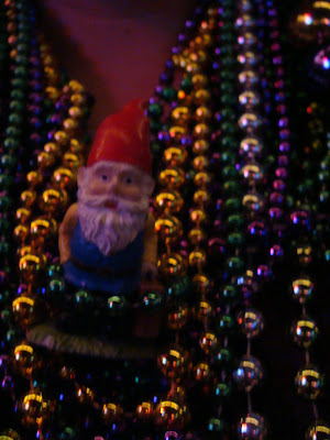 a gnome with beads in NOLA - tipsyterrier.blogspot.com